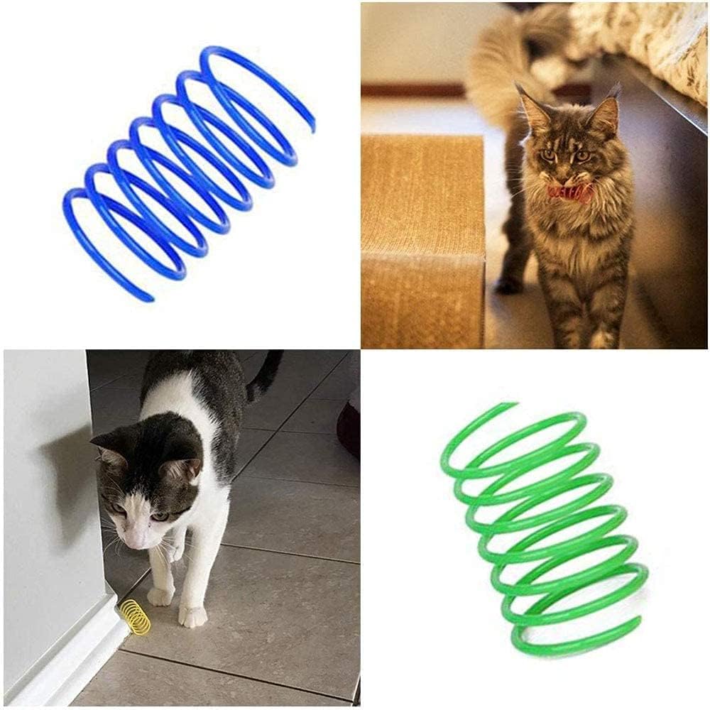 Cats playing with colourful plastic spring toys