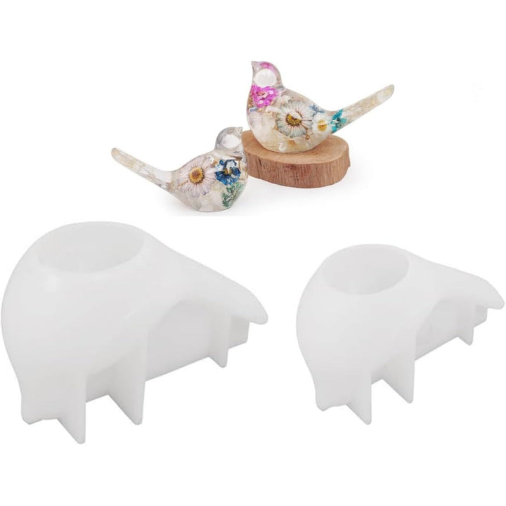 Two white bird-shaped silicone resin molds, view 1