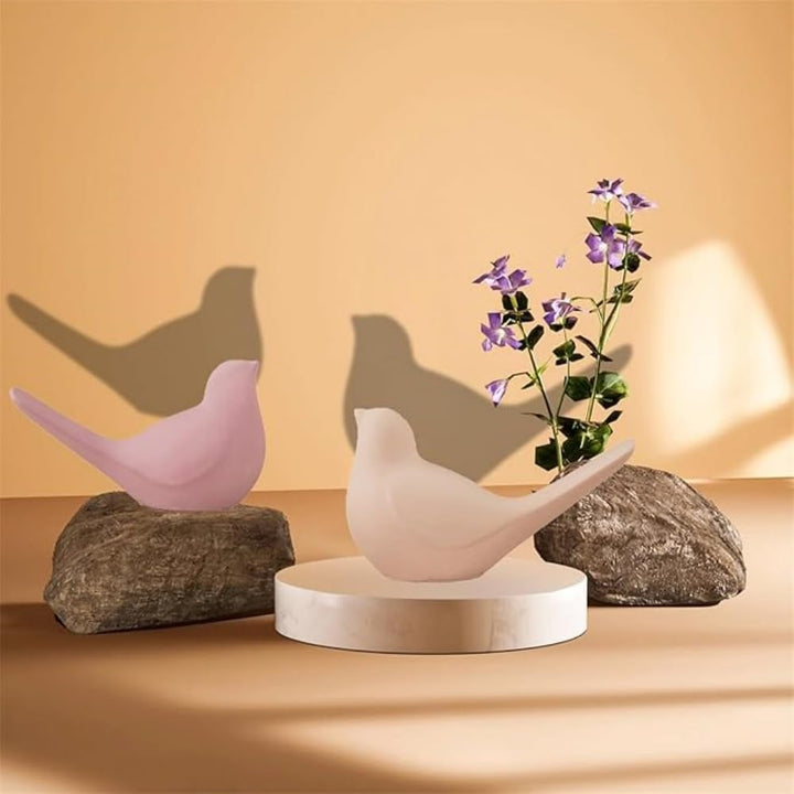 Two white bird-shaped silicone resin molds, view 5