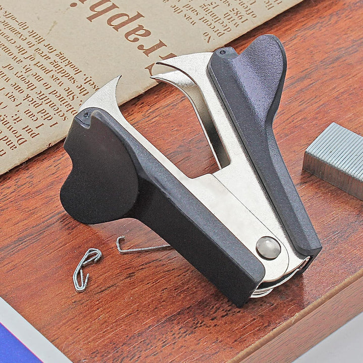 Three black claw-style staple removers, view 2