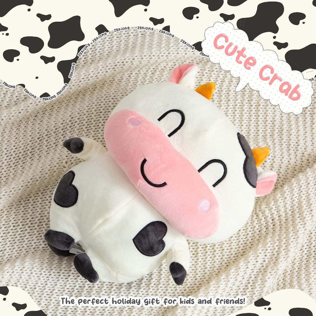 Cow plush on a blanket