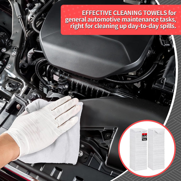 white microfiber cloth wiping an engine