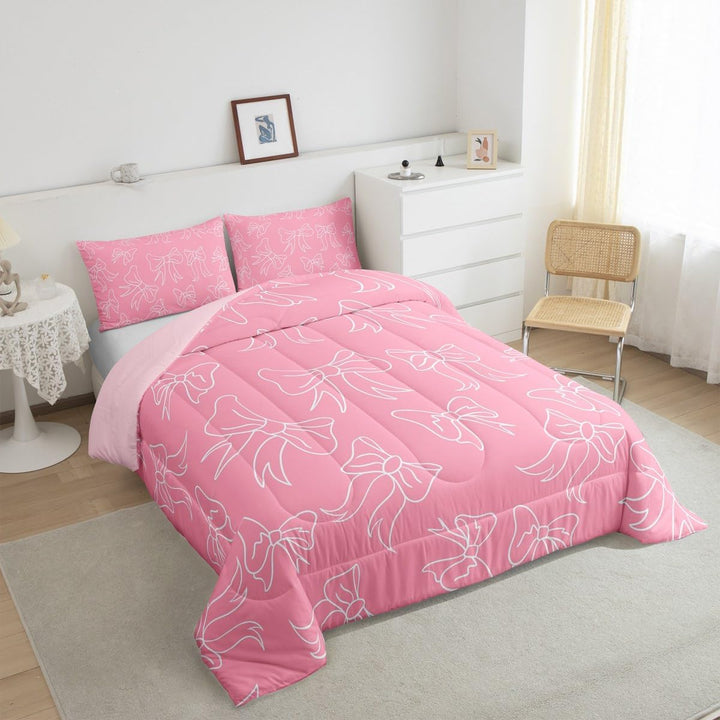 Pink bow comforter and pillowcase in bedroom