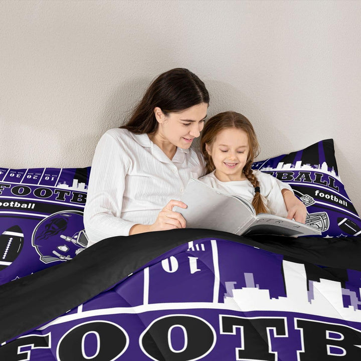 Purple football comforter fabric and pillow detail
