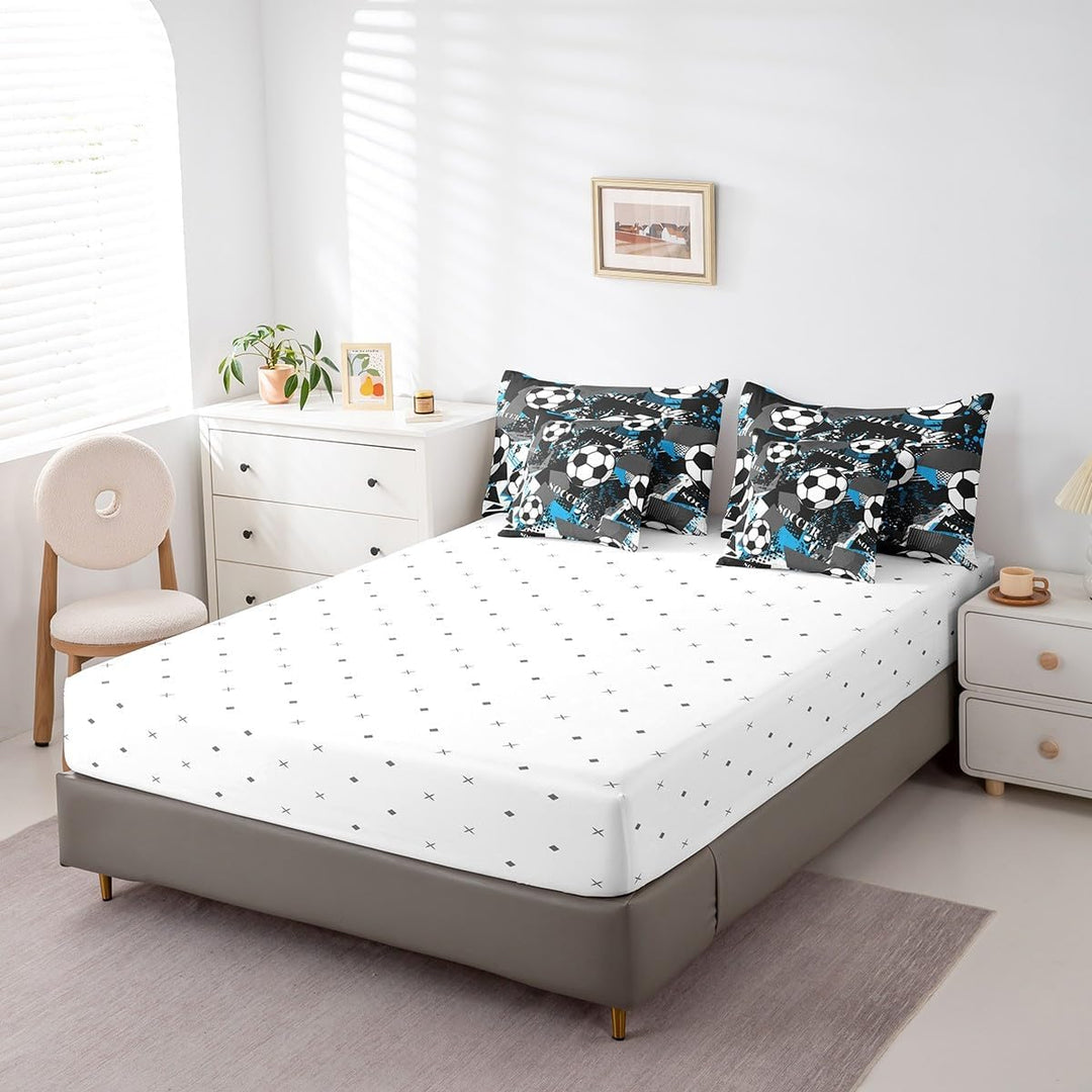 Soccer pillowcases and white sheet view