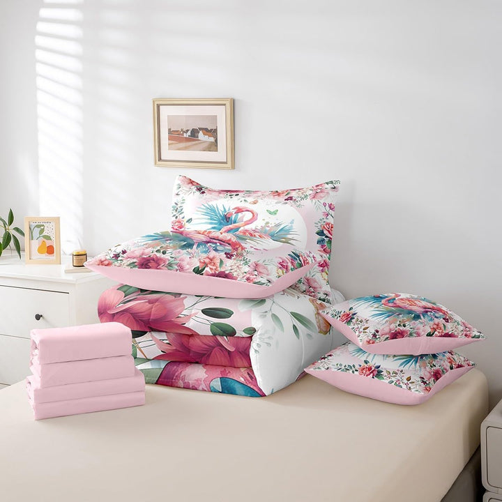 Seven floral flamingo bedding pieces folded