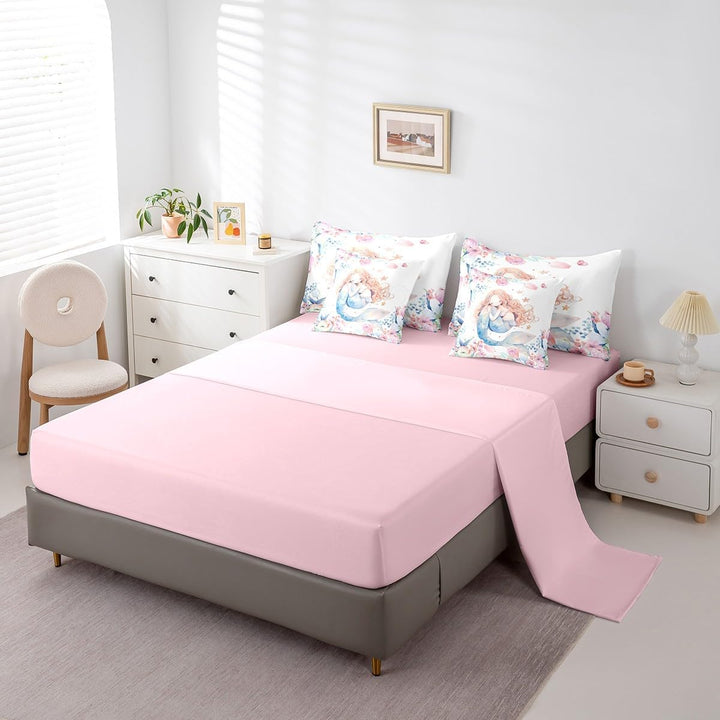 Pink fitted sheet and mermaid pillowcases