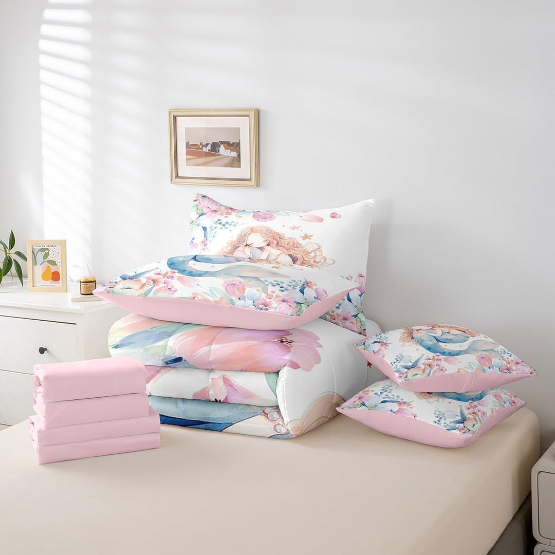 Seven mermaid bedding pieces folded