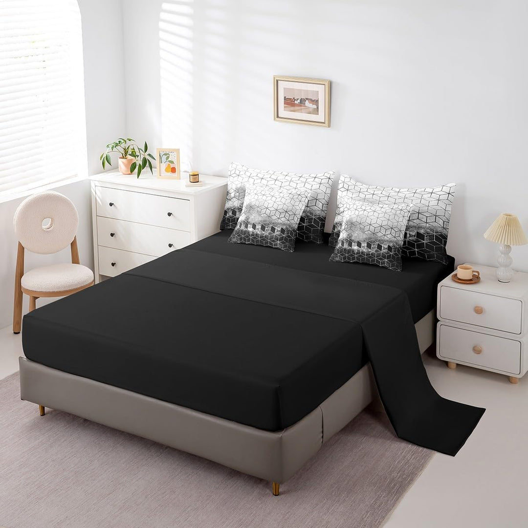 Black fitted sheet with geometric pillowcases