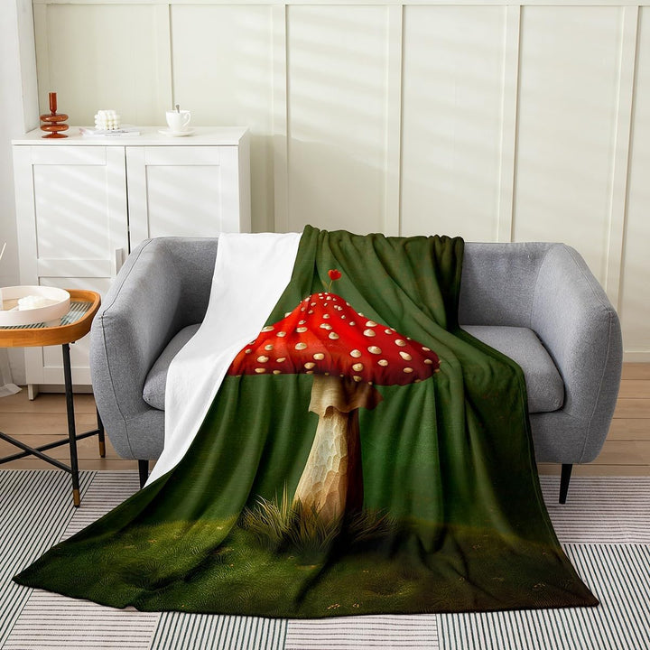 Green mushroom 50 by 60 inch throw blanket on sofa