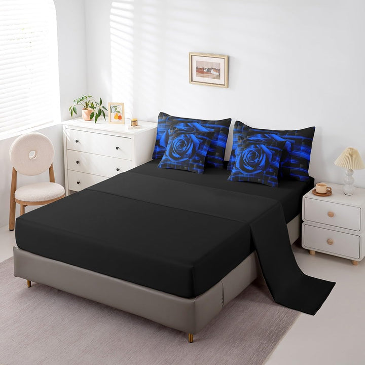 Black fitted and flat sheets with matching blue rose pillowcases