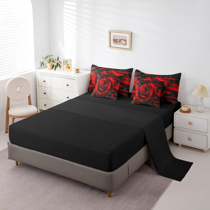 Black sheet with matching red rose pillowcases