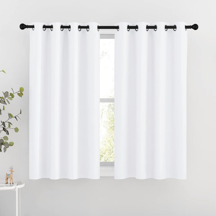 Pure white grommet curtain pair