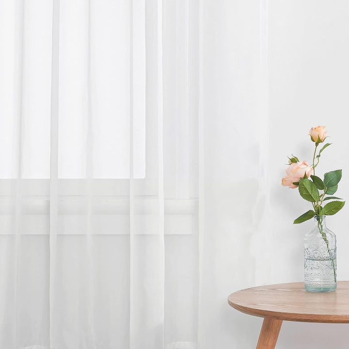 Ivory sheer curtain hanging detail