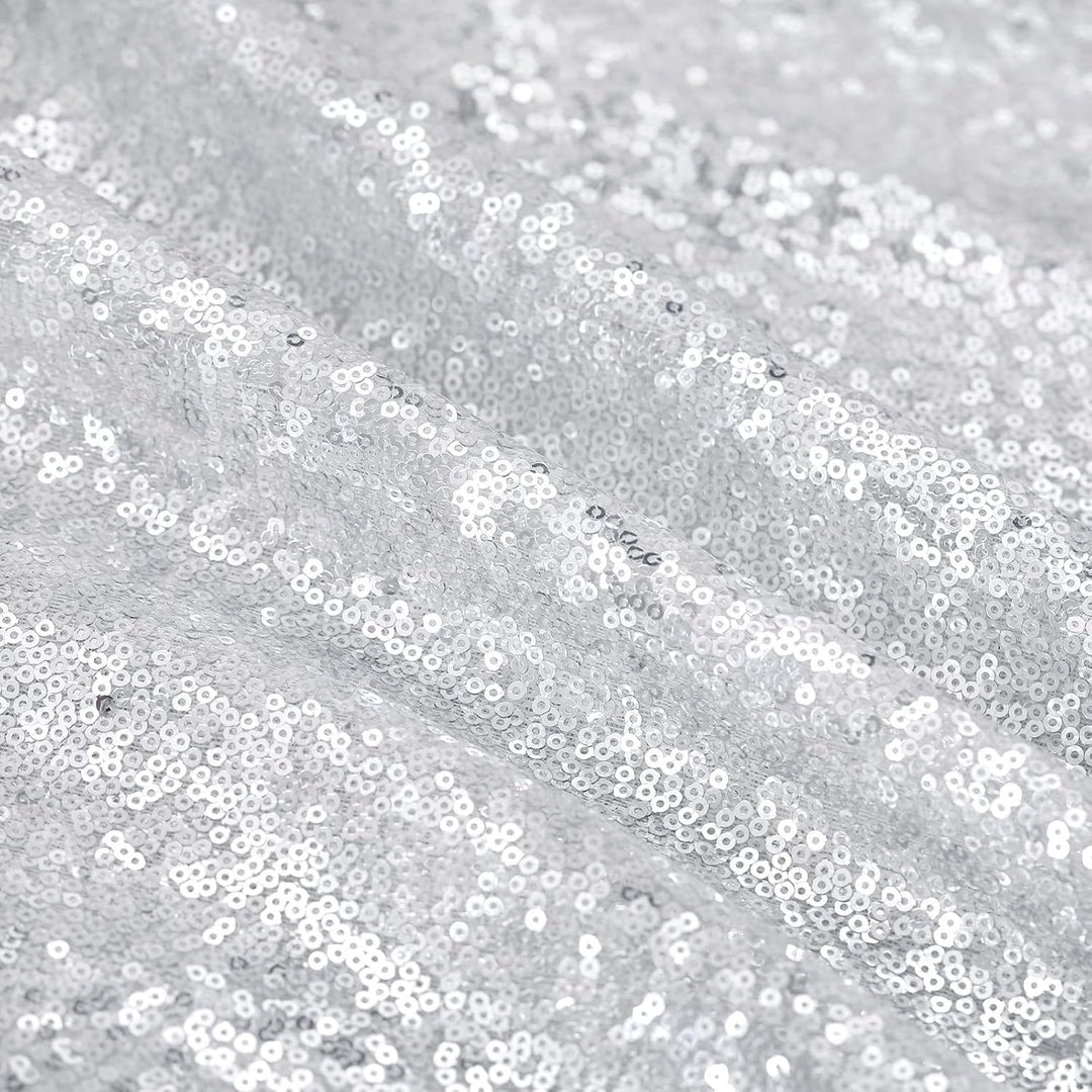 Close-up of silver sequin fabric texture
