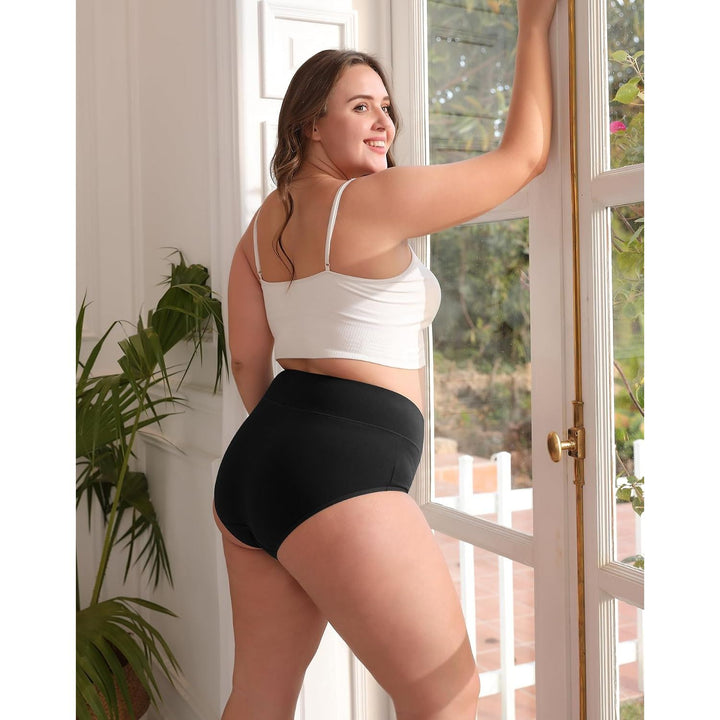 Black high-waisted briefs model rear view
