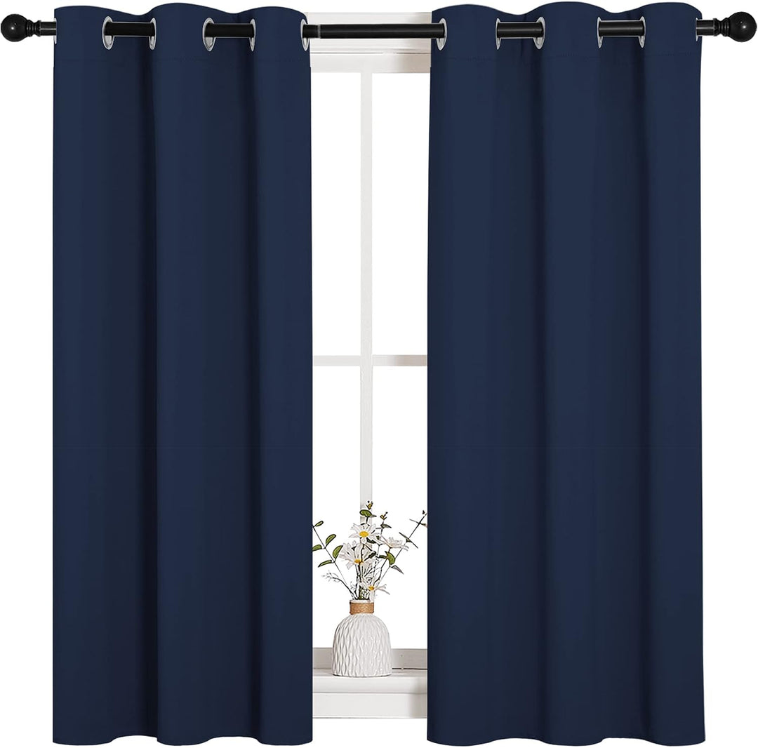 Pair of navy blue grommet curtain panels