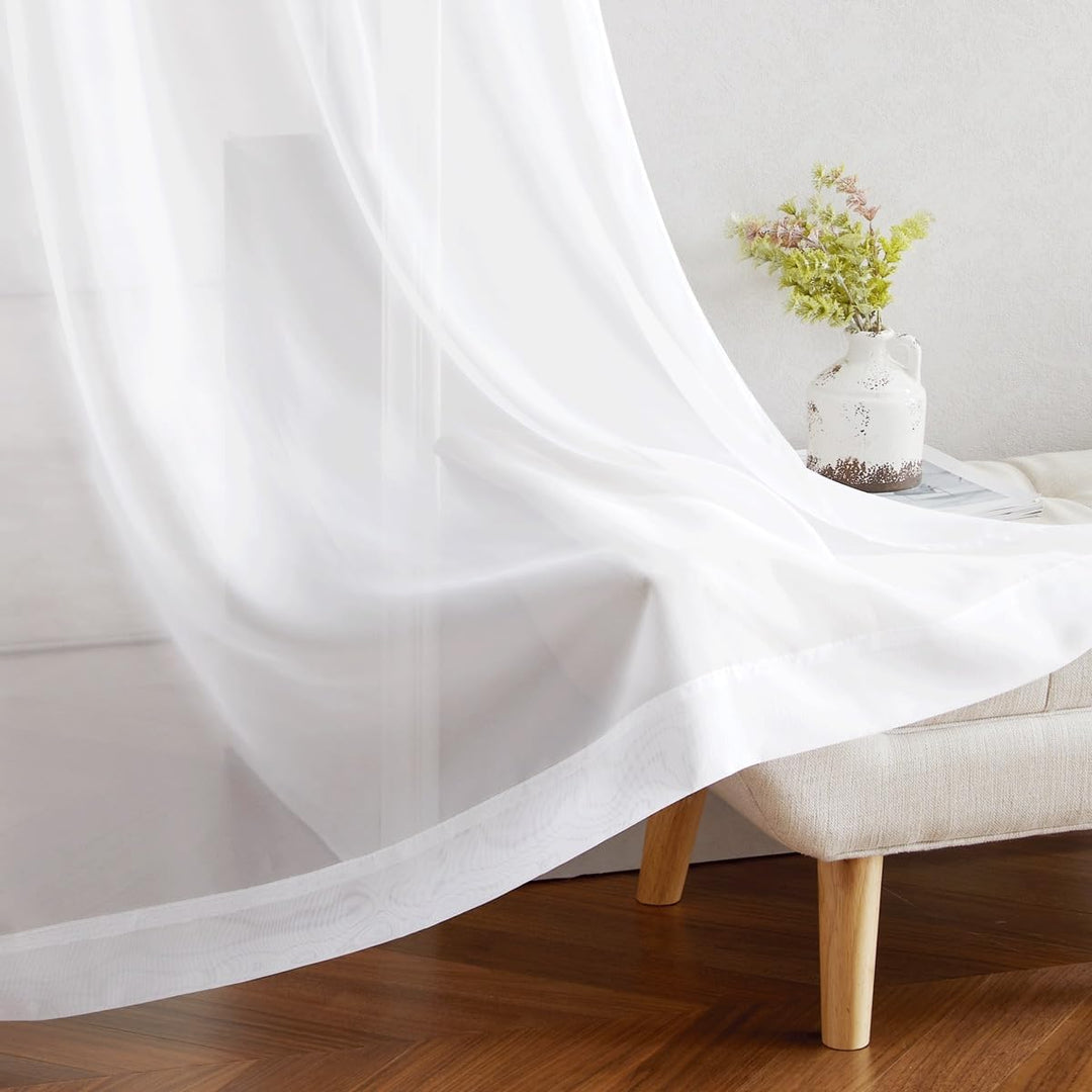 White sheer curtain lower hem and fabric
