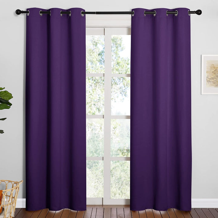 Royal purple curtains installed at window