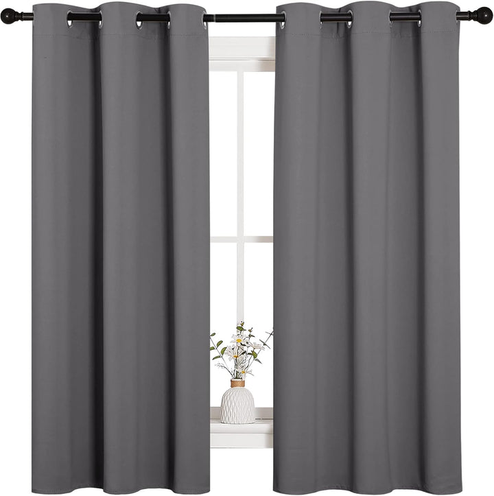 Grey curtain pair window view
