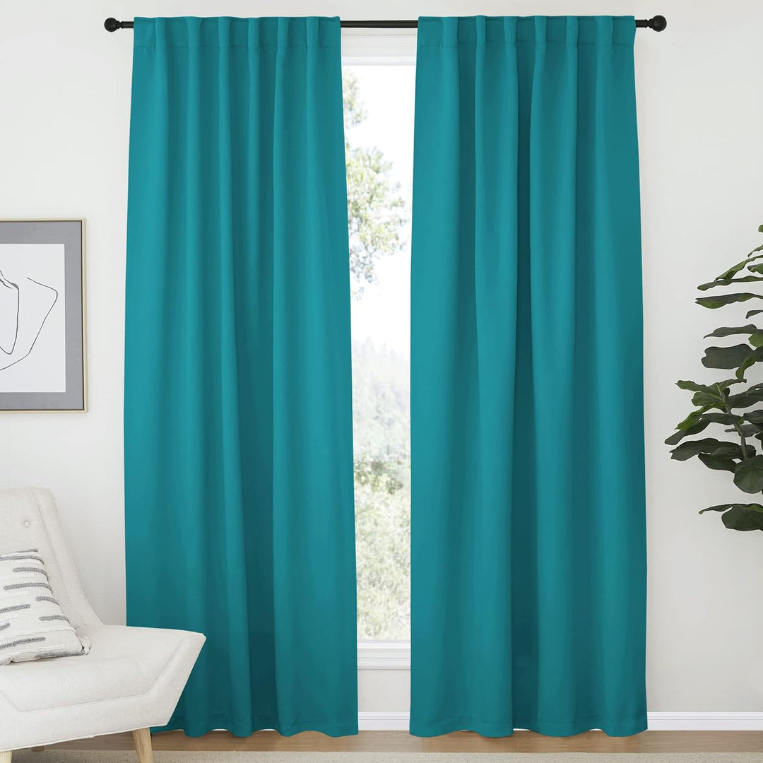Peacock teal blackout curtains, back tab hanging