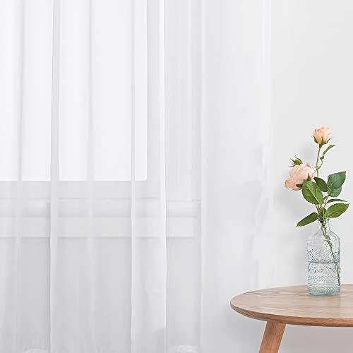 White sheer 60 x 45 inch curtains filtering daylight