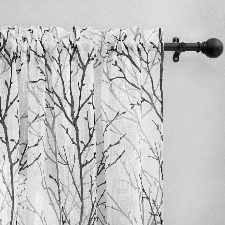Rod-pocket header detail on branch-print curtain