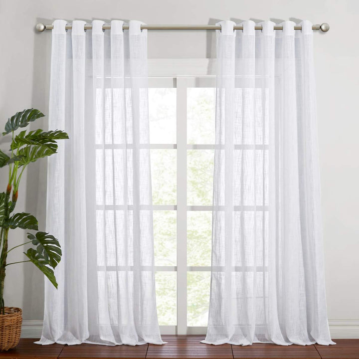 White sheer 70 x 95 inch grommet curtain pair at window