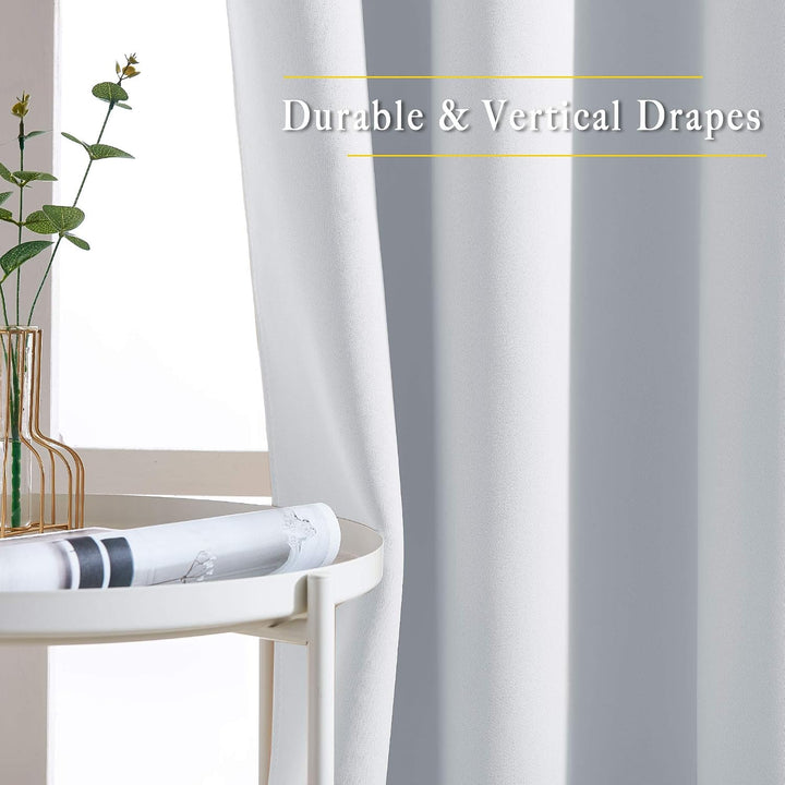Greyish white curtain drape and texture close-up