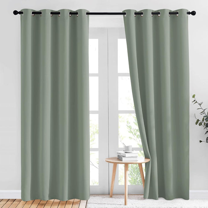 Sage green 52 x 84 inch grommet curtains on a window