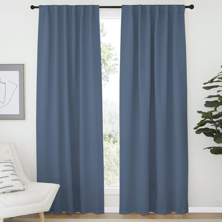 Stone blue 52 x 84 inch back-tab curtains in a room