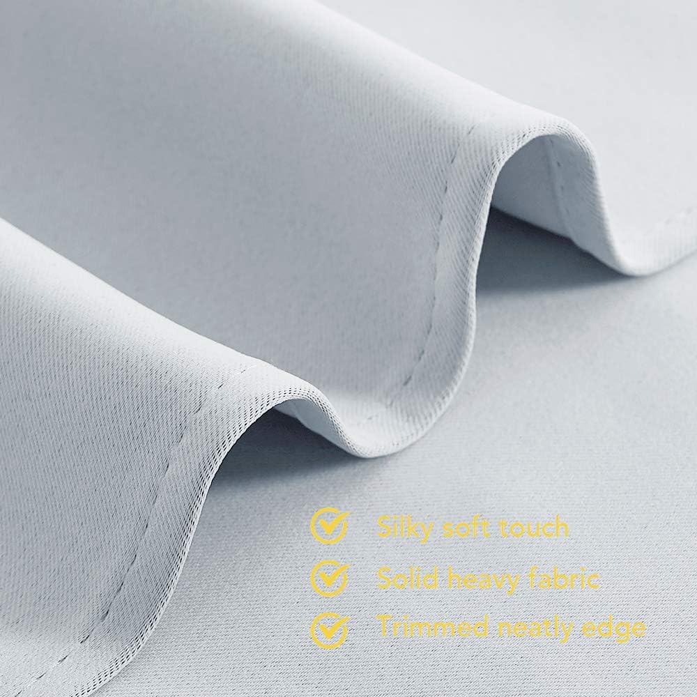 Greyish white curtain finished hem