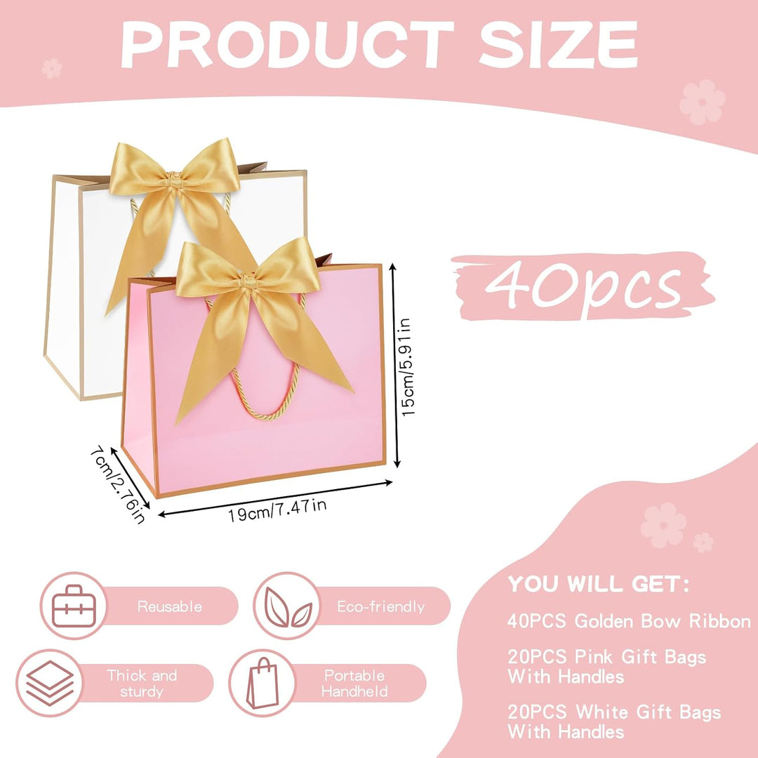 White and pink mini paper gift bags with gold handles and bows