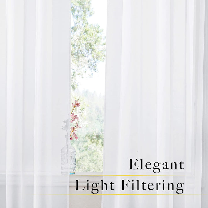 White sheer curtains filtering daylight at a window