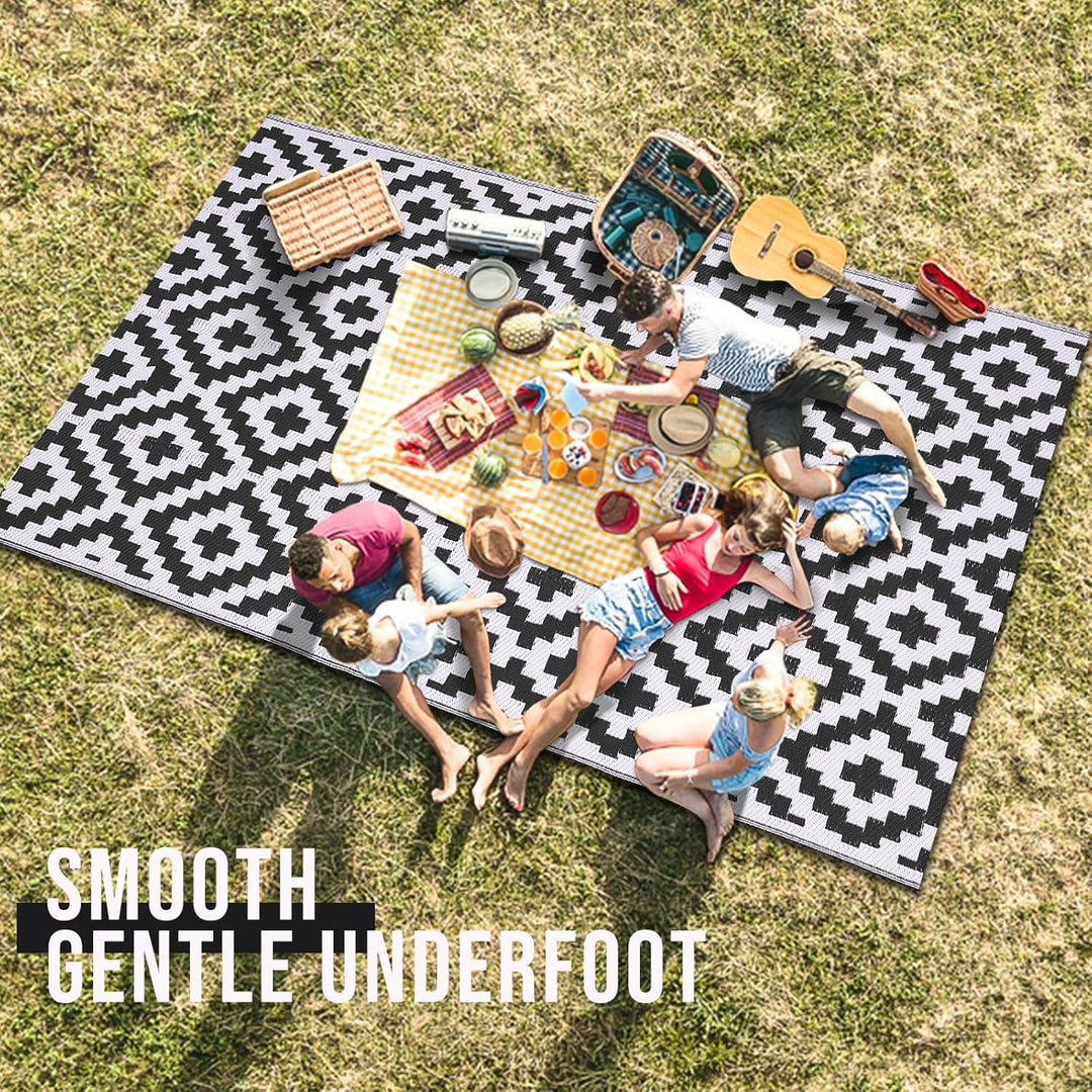 OLANLY Outdoor Rug Waterproof Reversible 5x8 ft, Durable Plastic Straw Patio Camping Carpet, Large Foldable RV Mat for Backyard, Deck, Picnic, Camper, Bench, All - Weather, Lightweight, Black & White - Just Closeouts Canada Inc.