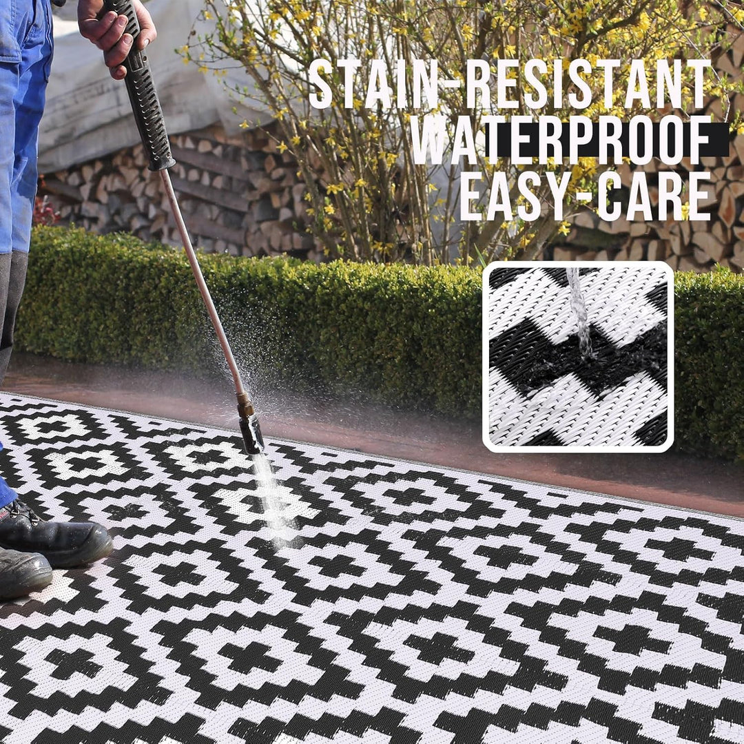 OLANLY Outdoor Rug Waterproof Reversible 5x8 ft, Durable Plastic Straw Patio Camping Carpet, Large Foldable RV Mat for Backyard, Deck, Picnic, Camper, Bench, All - Weather, Lightweight, Black & White - Just Closeouts Canada Inc.