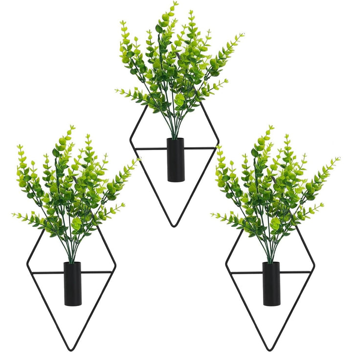 Black rhombus wall planter with artificial foliage, source view 1
