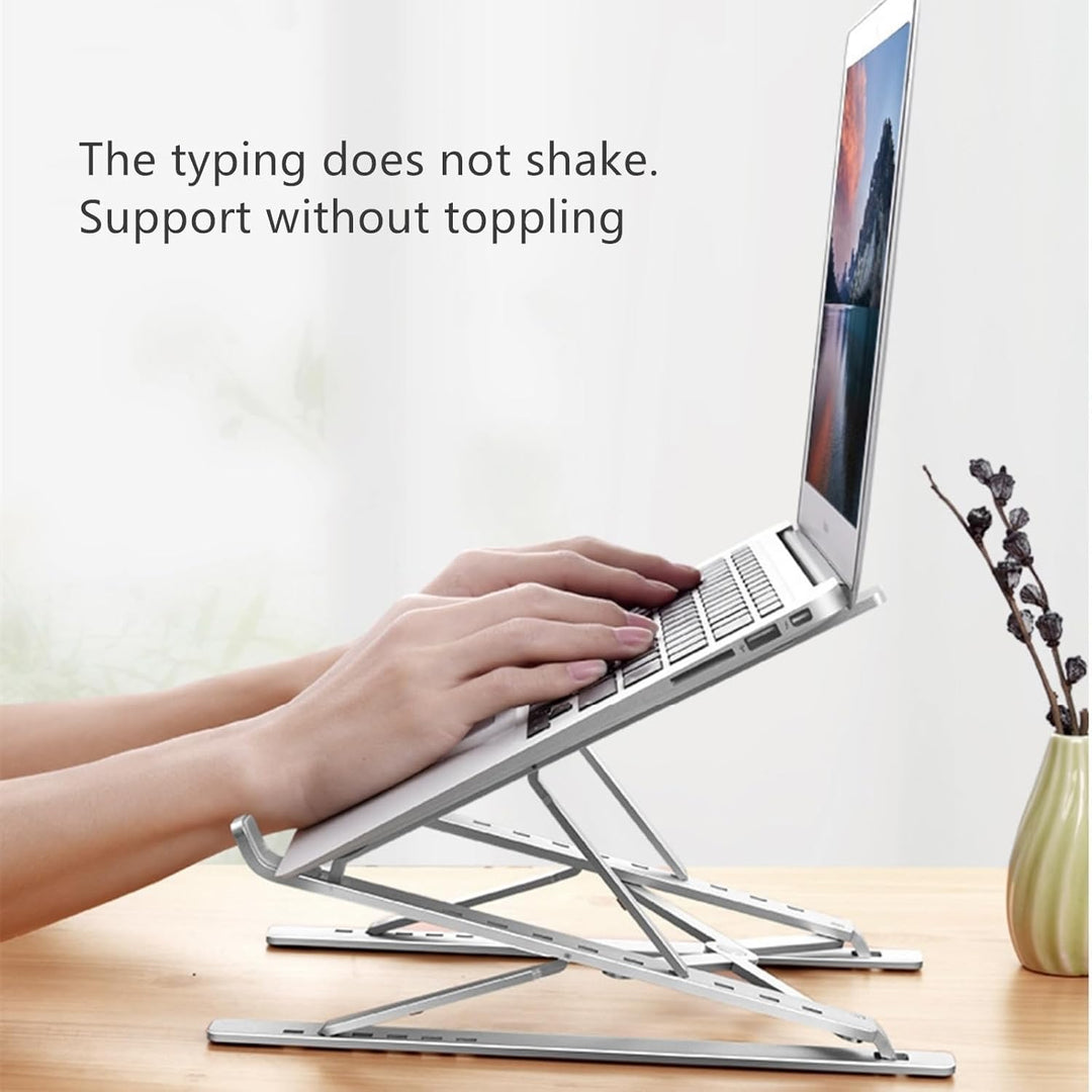 The Tablet Computer Features a Double - Layer Adjustable Stand Made of Aluminum Alloy, which is Portable, Stable, Heat - dissipating and ergonomically Designed for laptops ranging from 10 "to 17" - Just Closeouts Canada Inc.