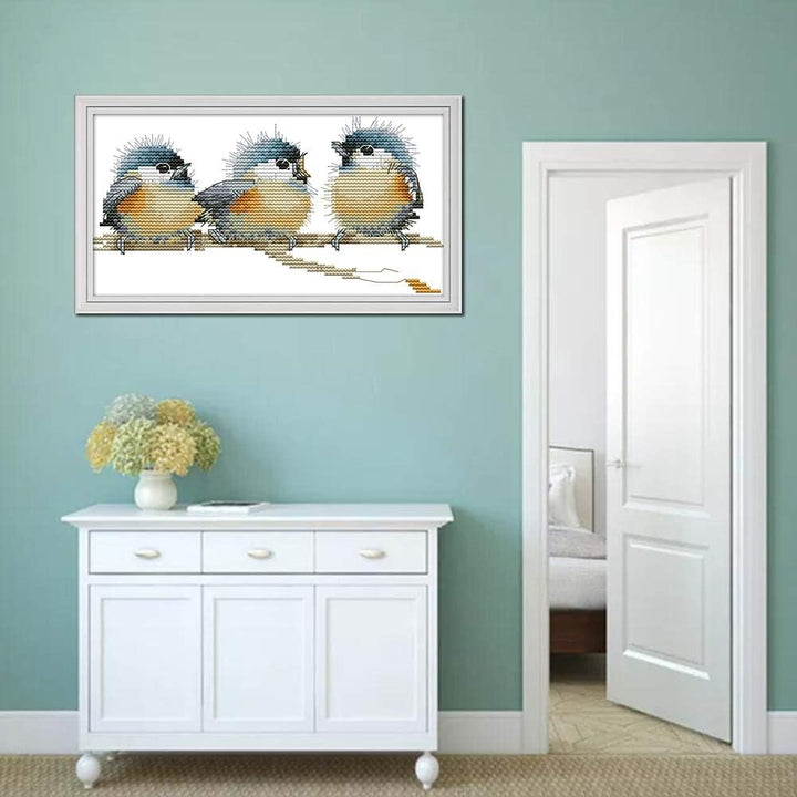 Three Birds artwork displayed; frame not included