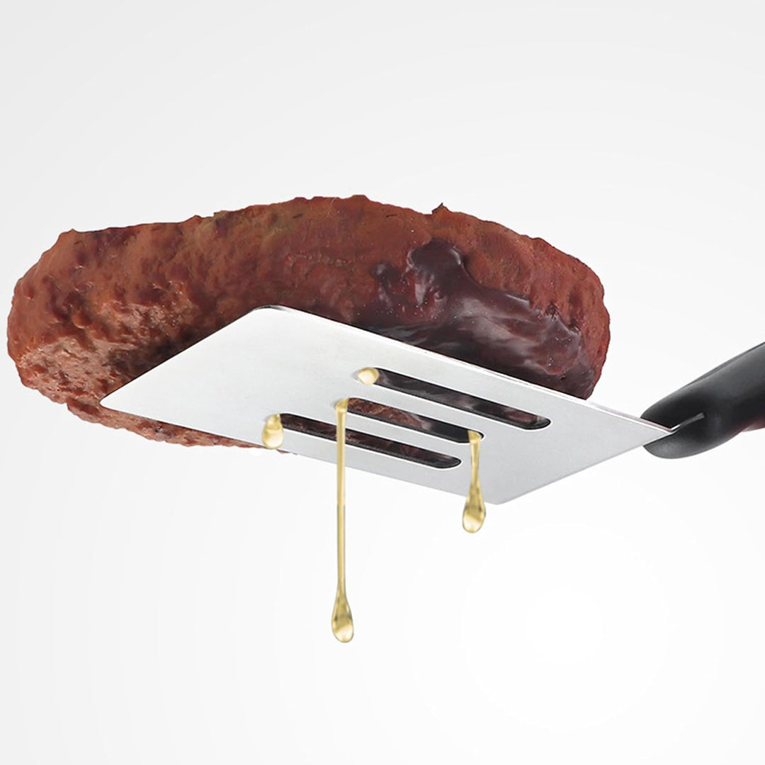 Slotted mini spatula in use for serving food