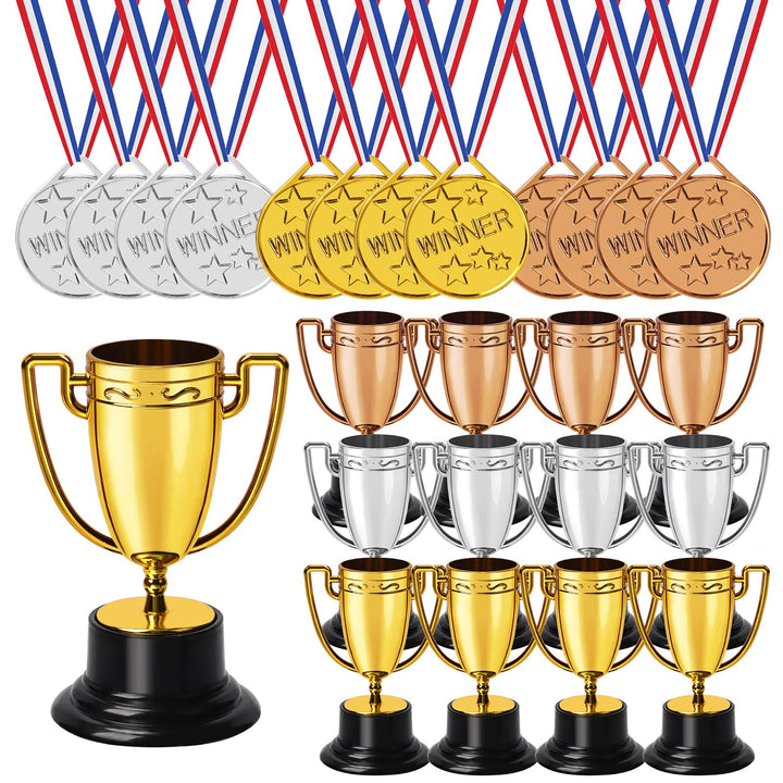 Gold, silver and bronze trophy cups with winner medals