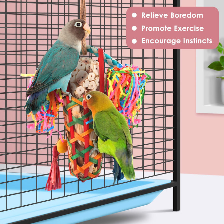 Lovebirds perched beside the foraging toy