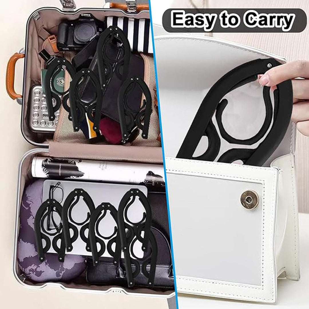 Thirty black folding travel clothes hangers